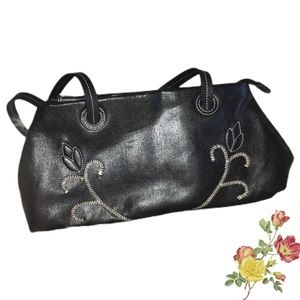 Black purse with embroidered flowers
